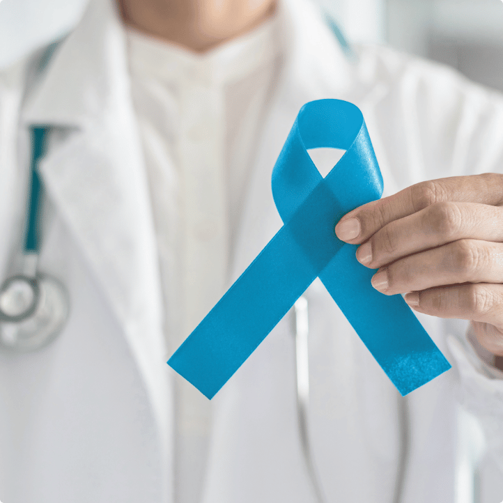 a doctor holding a blue ribbon